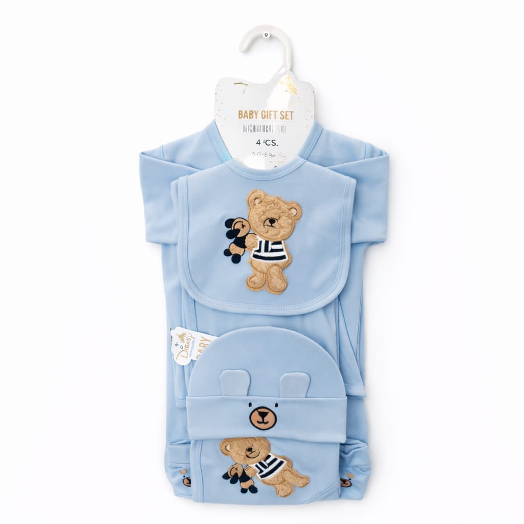Baby gift set with blue outfit, hat, and bib featuring teddy bear designs on a white background.