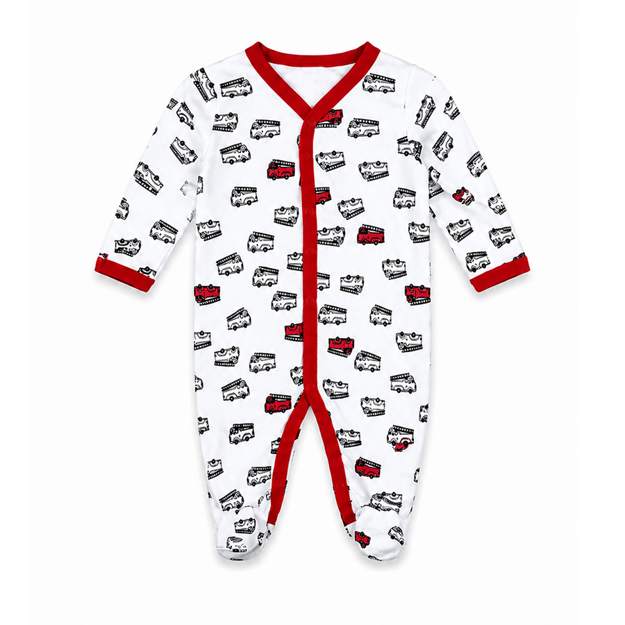 A baby long-sleeve footed sleeper in white, featuring an all-over black and red double-decker bus pattern, with red trim along the collar, snap closure, cuffs, and crotch.