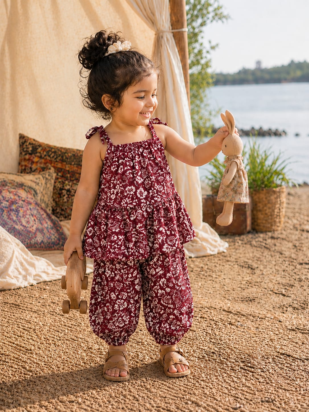 Shop the Bloom Girls Summer Set from Little Escape 2026. A lightweight printed co-ord featuring a flowy top and relaxed balloon-fit trousers, designed for breathable comfort and playful summer style.