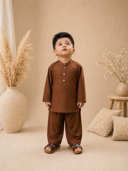 Premium Eid cord set for boys featuring a modern short kurta and relaxed trousers. Comfortable, stylish & perfect for Eid ul Adha. Limited stock.