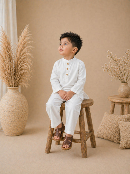 Premium Eid cord set for boys featuring a modern short kurta and relaxed trousers. Comfortable, stylish & perfect for Eid ul Adha. Limited stock.