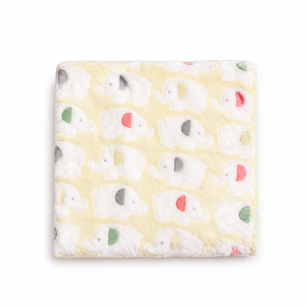 Baby blanket with elephant pattern on a light yellow background