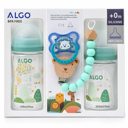 ALGO baby gift set in white packaging, featuring two clear glass bottles with mint green caps and colorful forest prints, a blue bear-shaped pacifier clip, and a mint green silicone teething bracelet.
