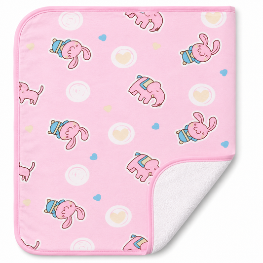 A square pink baby Changing Sheet with a cute cartoon pattern of pink rabbits, elephants, hearts, and dots, featuring a white plush reverse side.