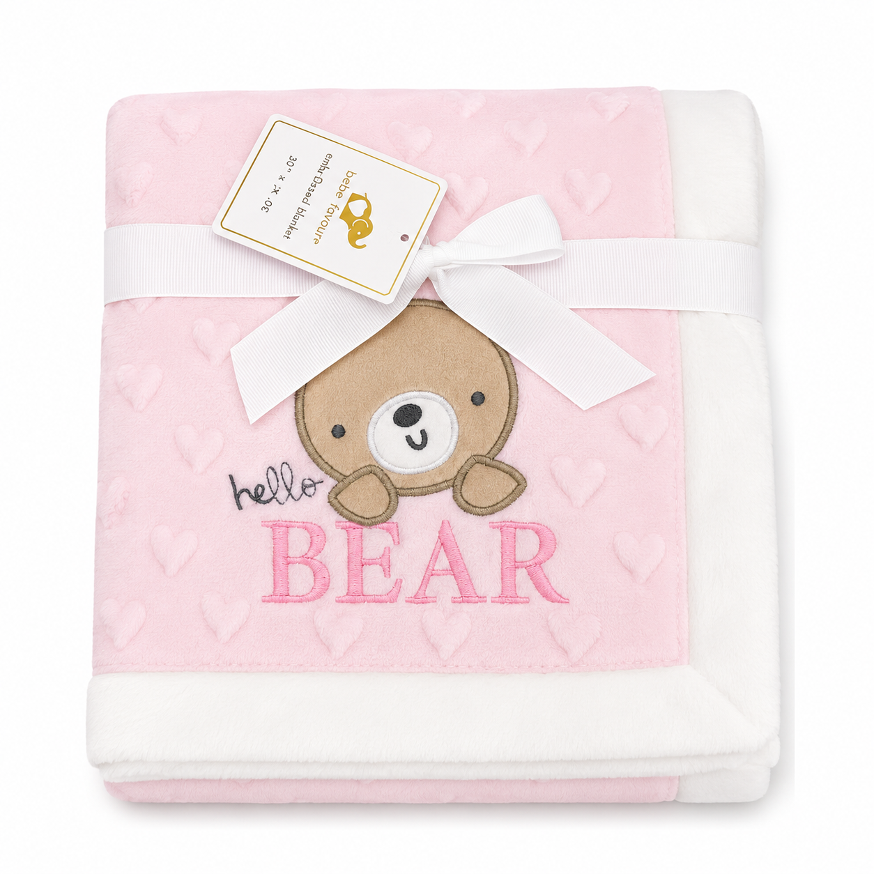 A folded baby blanket in light pink and white, featuring an embroidered brown bear face, pink 'BEAR' lettering, and a white ribbon with a paper tag tied around it, on a white background.