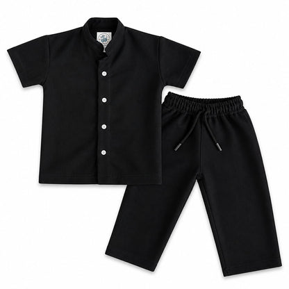 Black shirt and pants set on a white background