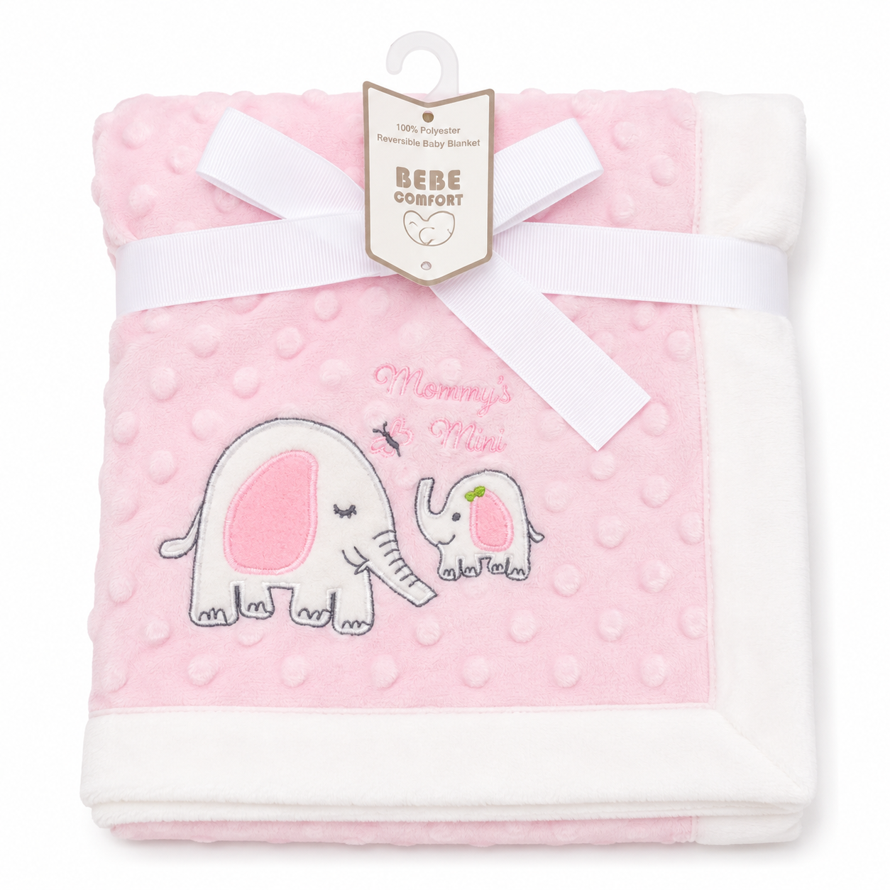 A folded pink minky dot baby blanket with a white border, featuring an embroidered elephant and baby elephant design with the text 'Mommy's Mine'. The blanket is tied with a white ribbon and a 'Bebe Comfort' paper tag is attached at the top.