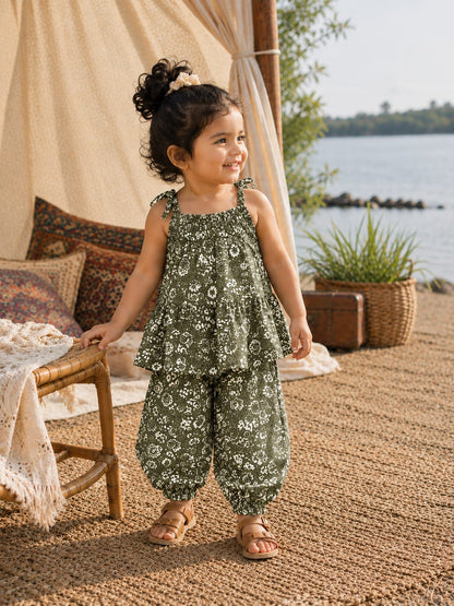 Shop the Bloom Girls Summer Set from Little Escape 2026. A lightweight printed co-ord featuring a flowy top and relaxed balloon-fit trousers, designed for breathable comfort and playful summer style.