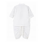 A white two-piece baby clothing set shown from the back, featuring a full sleeve top with side ties and matching dhoti with a patterned waistcoat