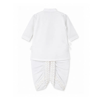 A white two-piece baby clothing set shown from the back, featuring a full sleeve top with side ties and matching dhoti with a patterned waistcoat