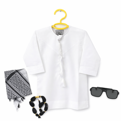 White shirt on a yellow hanger with a black and white checkered headscarf, necklace, and sunglasses on a white background