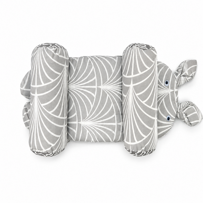 A plush baby support pillow shaped like a rabbit, featuring a gray and white geometric fan pattern, photographed on a solid white background.