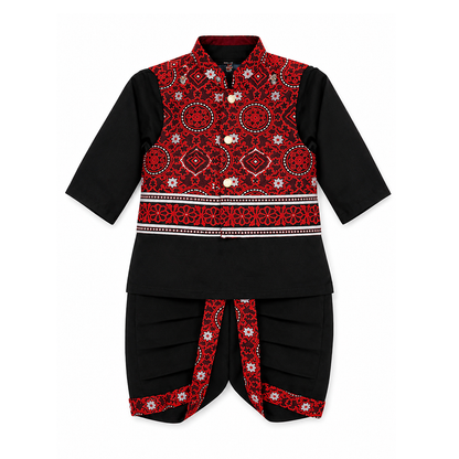 A traditional outfit for boys, featuring a black dhoti with ajrak patterned borders, paired with a matching red ajrak waistcoat and a black kurta with full sleeves.