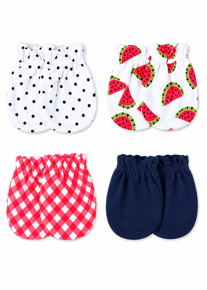 Four pairs of baby bloomers or booties arranged in a 2x2 grid on a white background. The top-left pair is white with black polka dots.