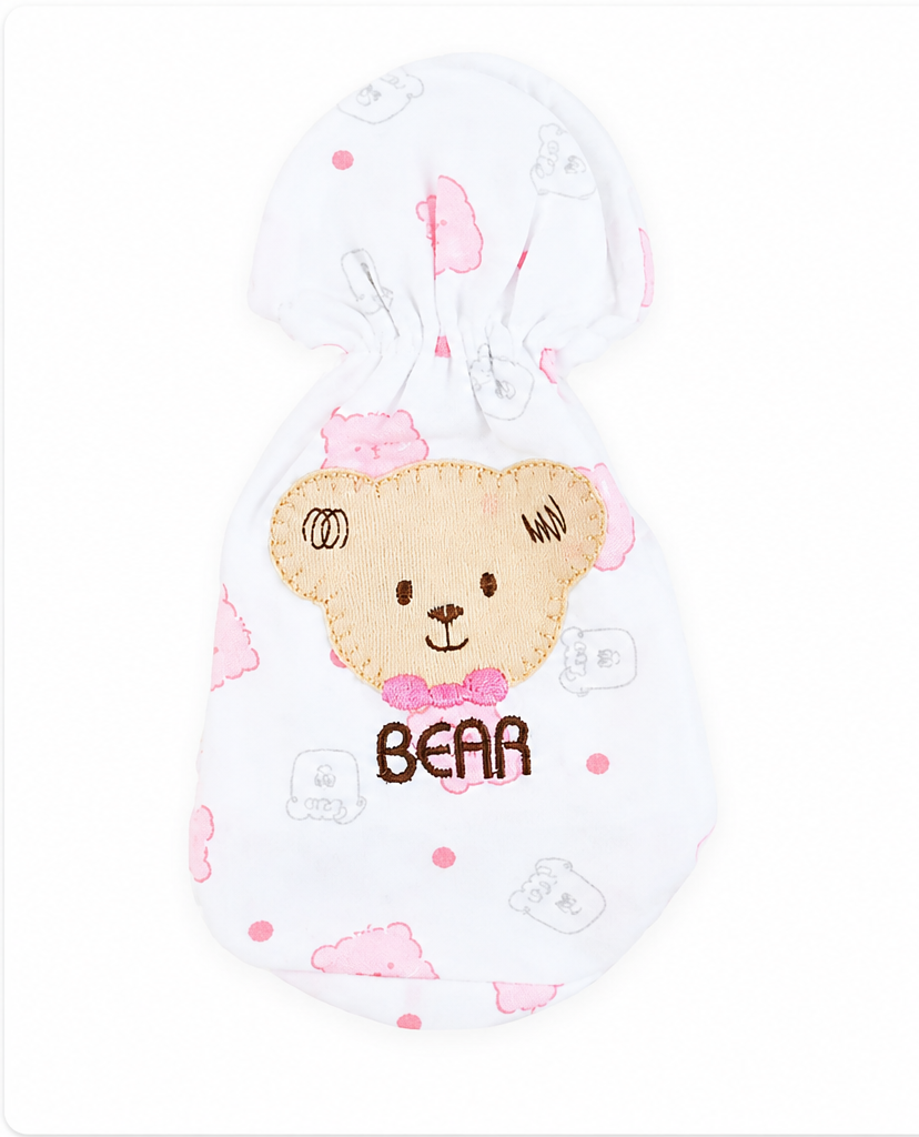 Baby feeder cover with teddy bear design and pink polka dots on a white background