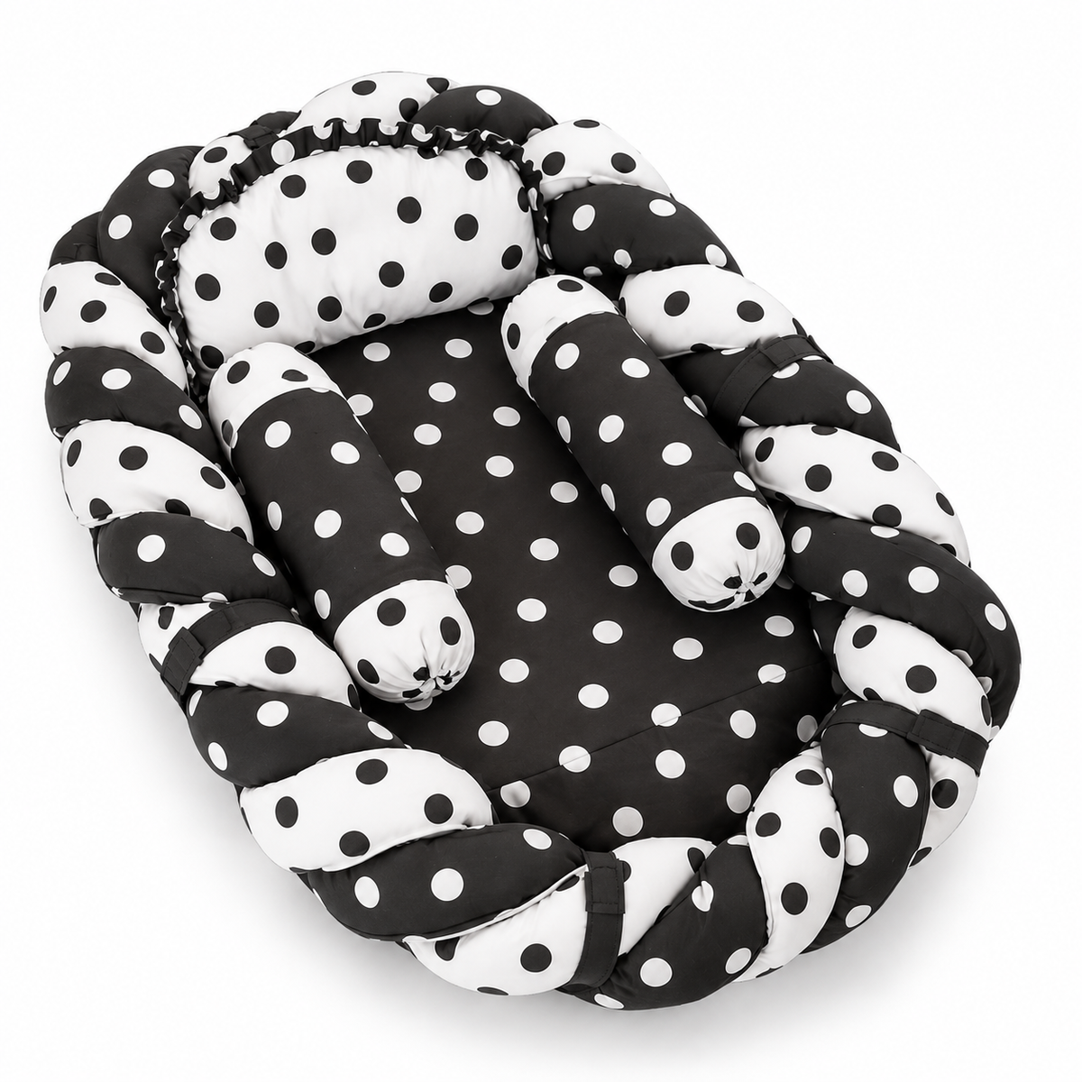 Black and white polka dot baby snuggle bed with two neck rolls and matching pillow by BabyCo Pakistan