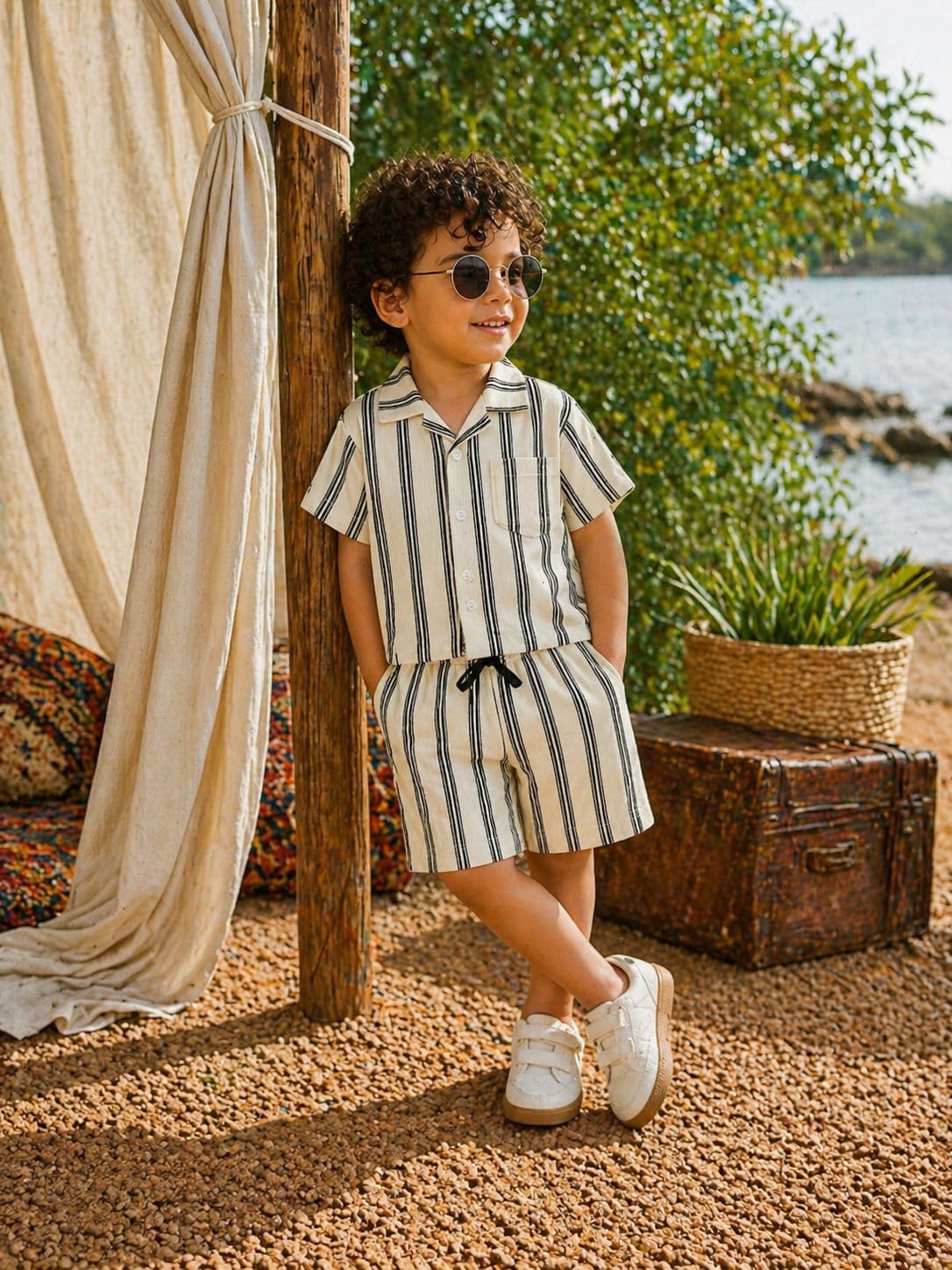 Child wearing Sand Monaco white co-ord set by BabyCo