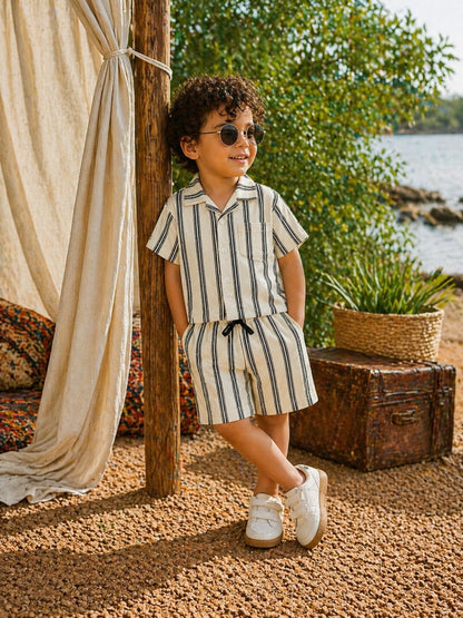 Child wearing Sand Monaco white co-ord set by BabyCo
