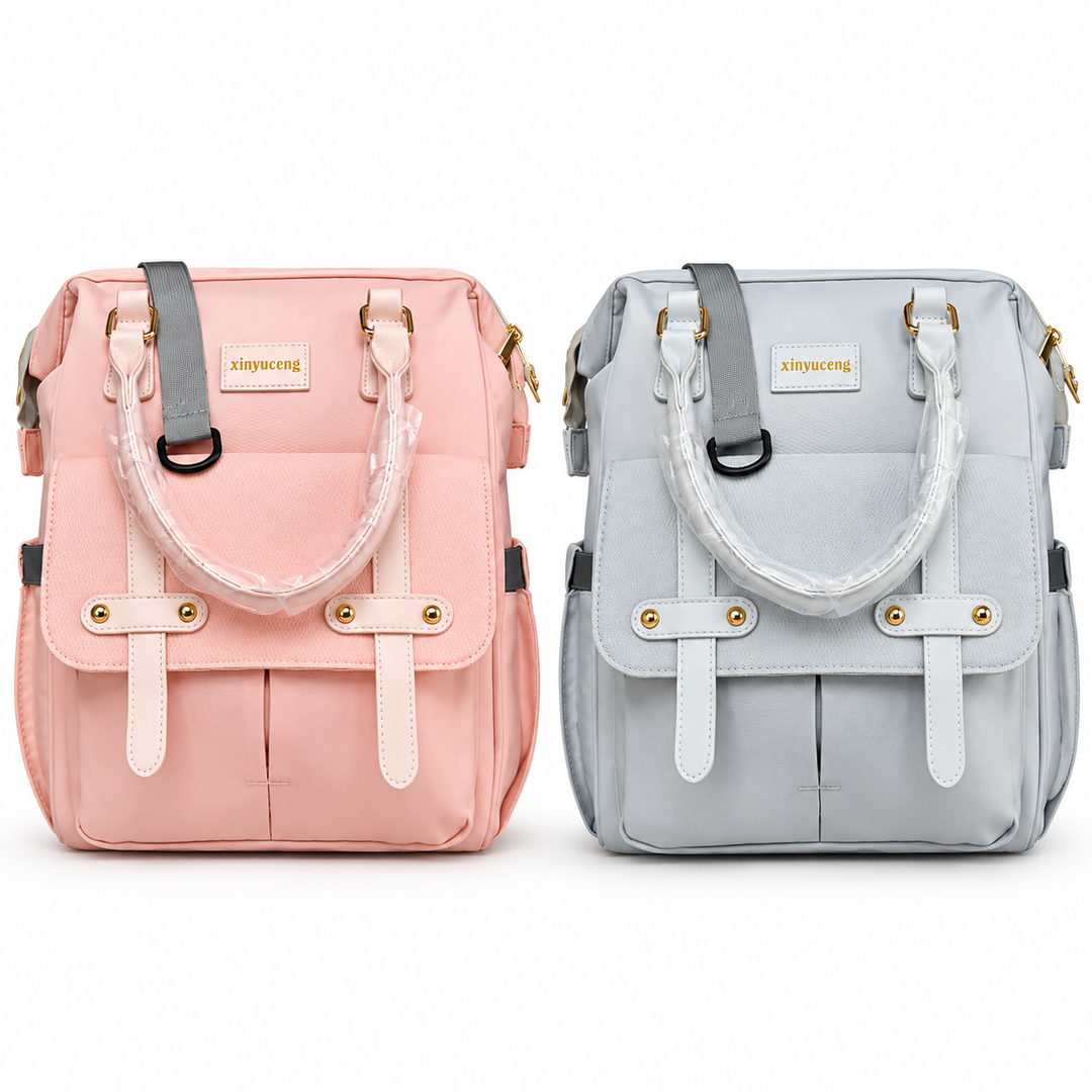Xinyu Celeste baby diaper backpack in pink and white on clean white background